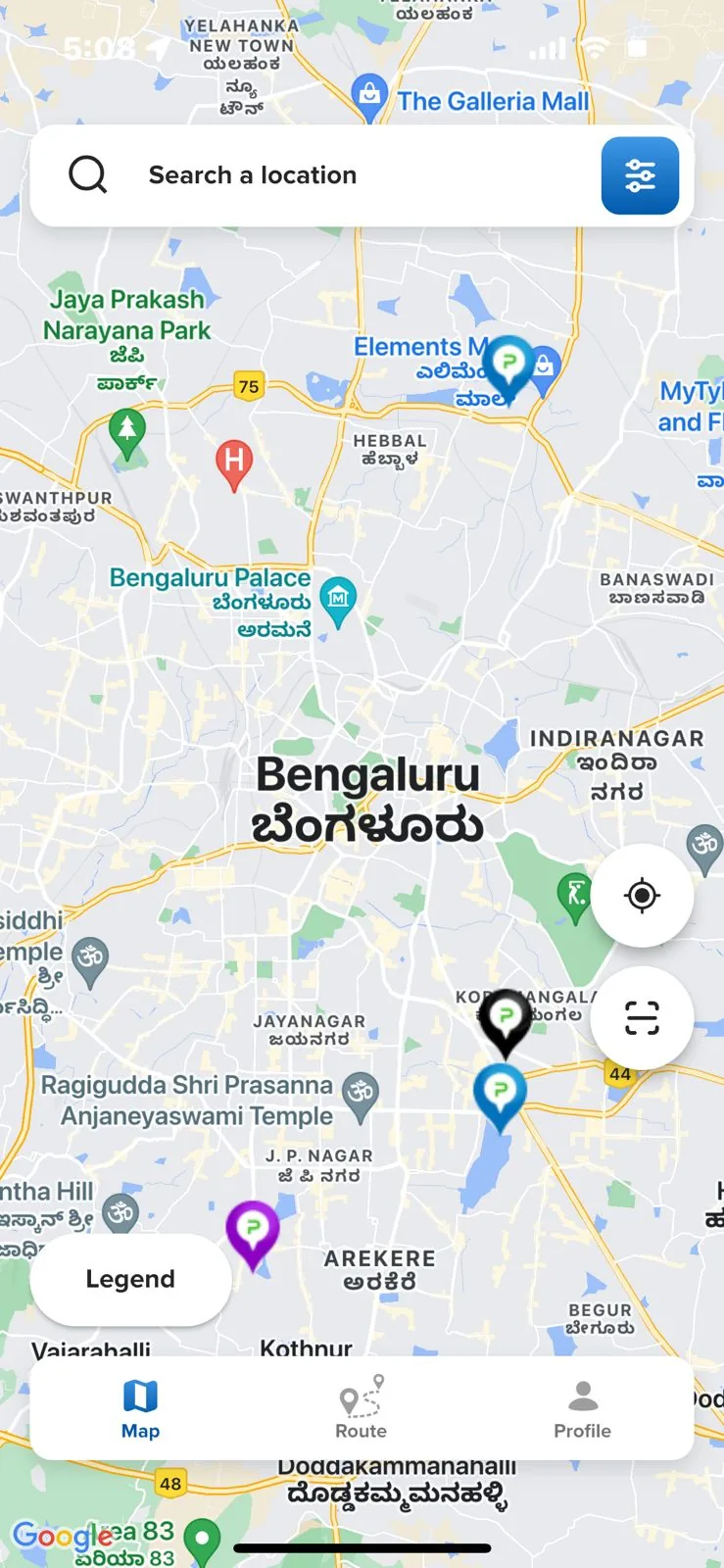 The app's map of Bengaluru with charging stations pinned across the city.